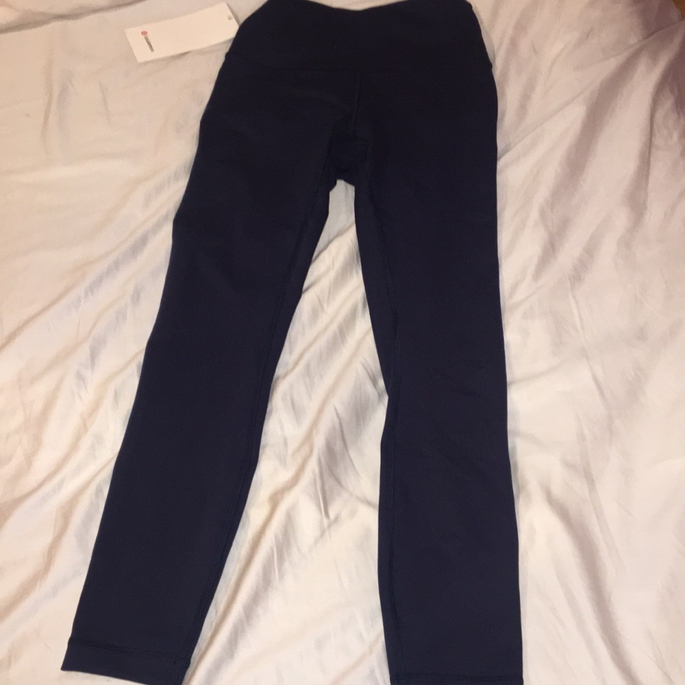 Brand new size four navy blue lulu lemon leggings